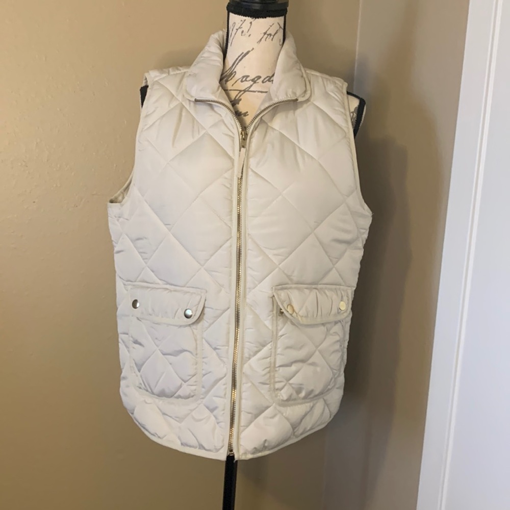 Cream puffy vest